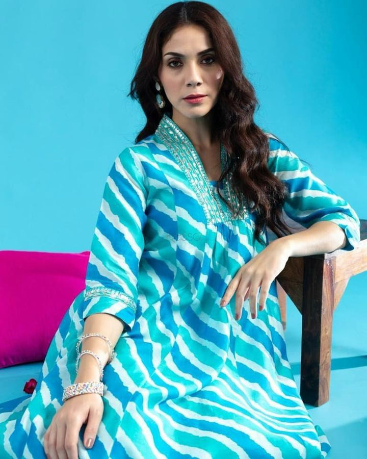Blue Cotton Anarkali Kurta Pant Set With Neck Embroidery For WomenMaterial composition : 100% CottonLength : Knee LengthSleeve type : 3/4 SleeveMaterial type : CottonOccasion : Casual ,Office wear ,Party ,Wedding , Ragular &amp; FeBlue Cotton Anarkali Kurta Pant Set