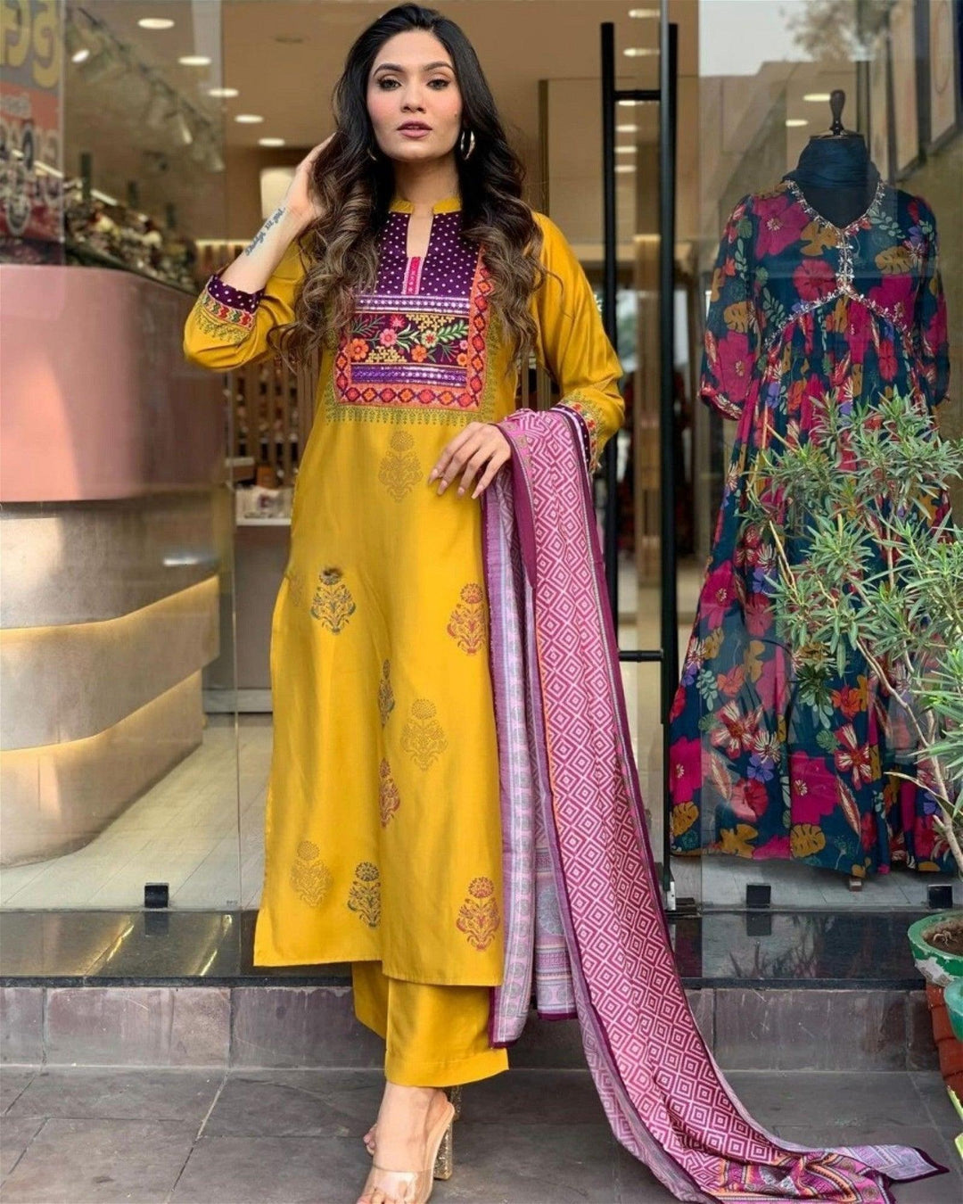 Women Embroidered Straight Kurta Set with DupattaTop Fabric :  Muslin
Bottom Fabric : Rayon
Dupatta Fabric :Chanderi
Work : Printed &amp; Embroidery
Occasion : Party wear,Casual Wear
 
Women Embroidered Straight Kurta Set