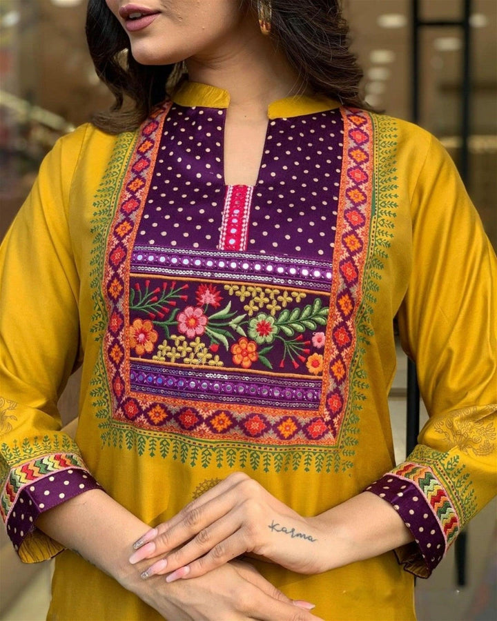 Women Embroidered Straight Kurta Set with DupattaTop Fabric :  Muslin
Bottom Fabric : Rayon
Dupatta Fabric :Chanderi
Work : Printed &amp; Embroidery
Occasion : Party wear,Casual Wear
 
Women Embroidered Straight Kurta Set