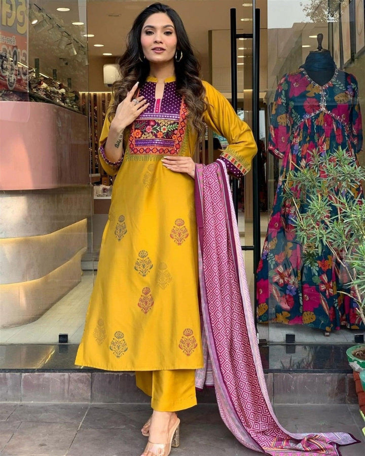 Women Embroidered Straight Kurta Set with DupattaTop Fabric :  Muslin
Bottom Fabric : Rayon
Dupatta Fabric :Chanderi
Work : Printed &amp; Embroidery
Occasion : Party wear,Casual Wear
 
Women Embroidered Straight Kurta Set