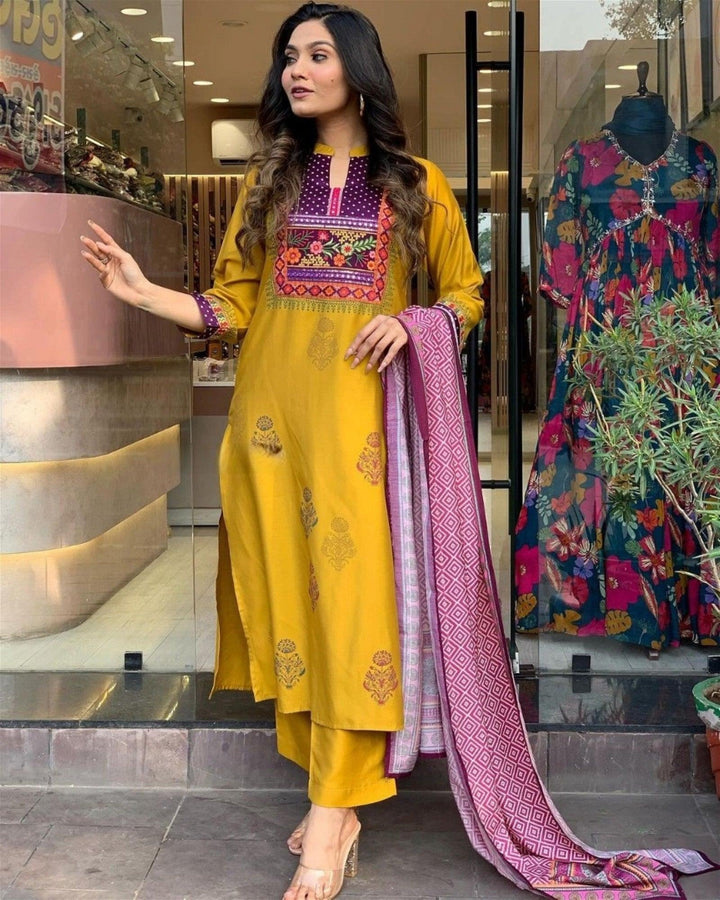 Women Embroidered Straight Kurta Set with DupattaTop Fabric :  Muslin
Bottom Fabric : Rayon
Dupatta Fabric :Chanderi
Work : Printed &amp; Embroidery
Occasion : Party wear,Casual Wear
 
Women Embroidered Straight Kurta Set