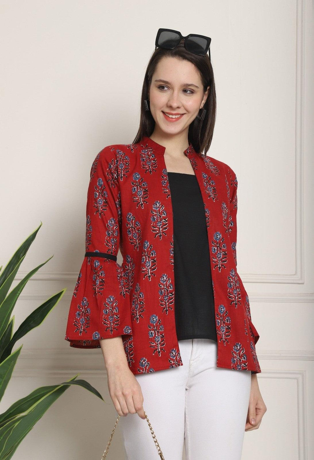 Maroon & Black Pure cotton Jaipuri Printed Short TopTop Fabric: Pure cotton
Top Color: Maroon &amp; Black
Top Work: Jaipuri Printed
Neck Style: Chinese/Mandarin-neck
Sleeve Type: Full sleeve
Sleeve Length: 21 IncMaroon & Black Pure cotton Jaipuri Printed Short Top