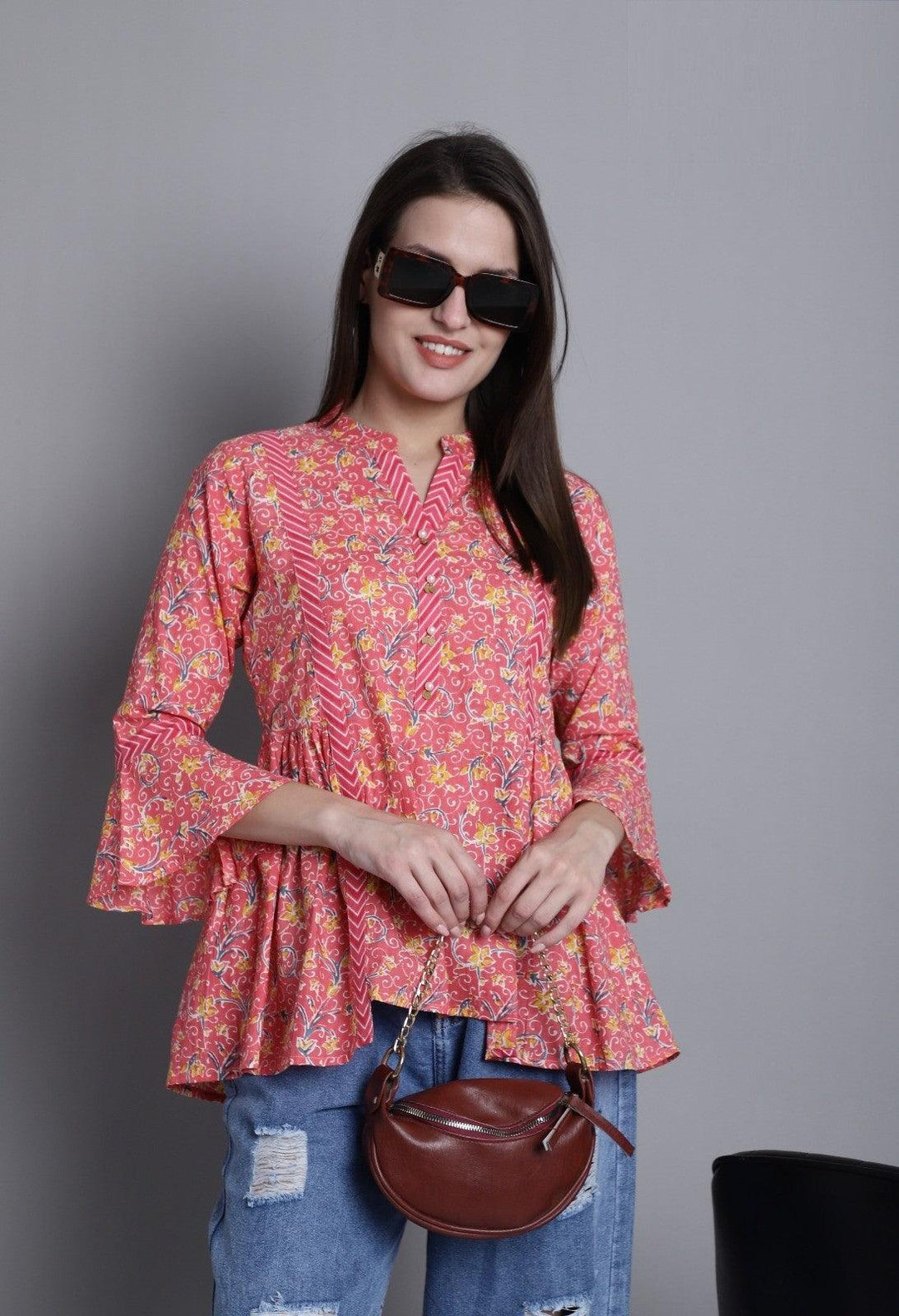 Peach Pure cotton Jaipuri Printed Short TopTop Fabric: Pure cotton
Top Color: Peach
Top Work: Jaipuri Printed
Work Type: Jaipuri Printed, Pearl with fancy Tassels
Neck Style: Chinese/Mandarin-neck
SleevePeach Pure cotton Jaipuri Printed Short Top