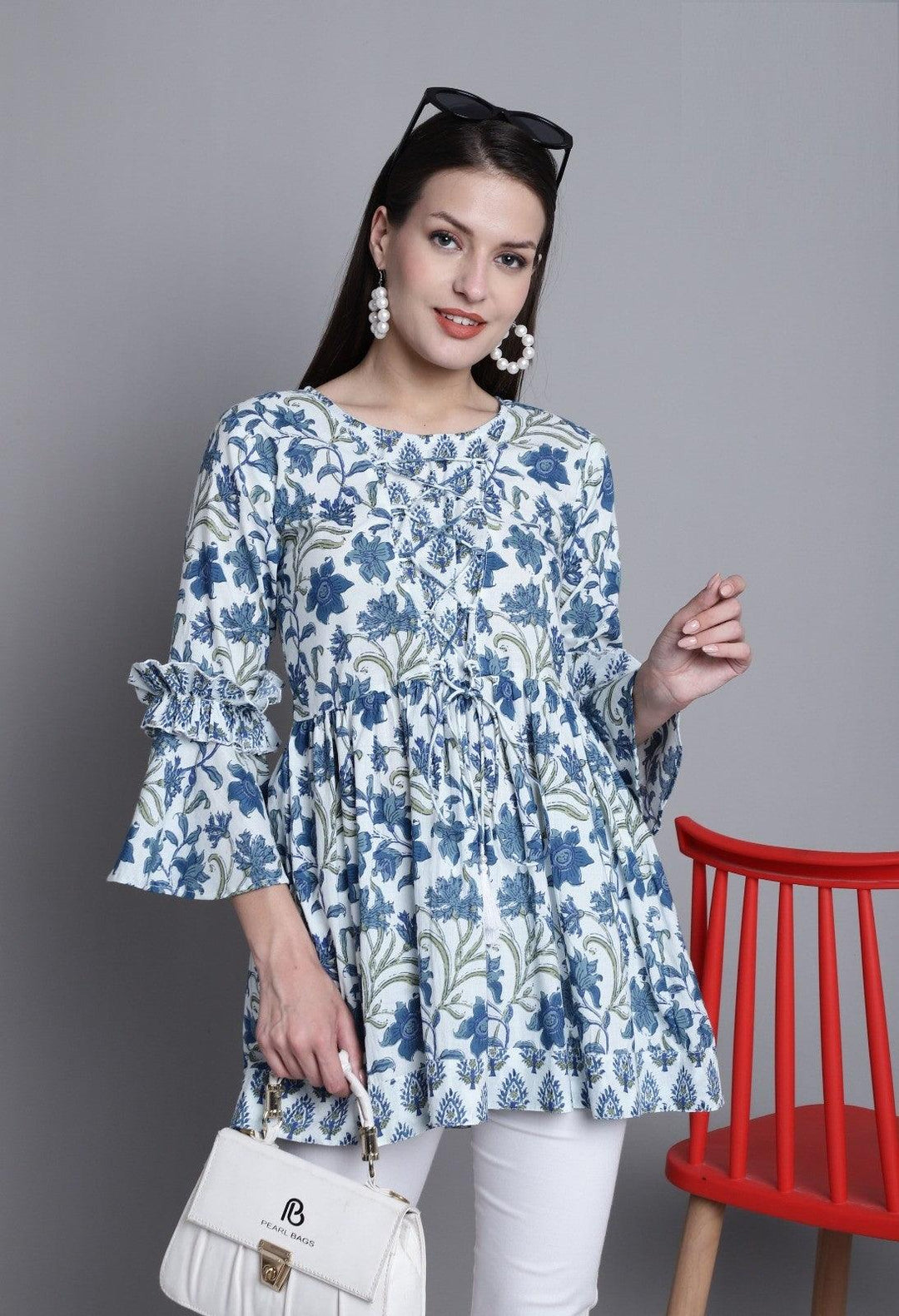 White & Blue Pure cotton Jaipuri Printed Short TopTop Fabric: Pure cotton
Top Work: Jaipuri Printed
Work Type: Jaipuri Printed with fancy Tassels
Neck Style: Round Neck
Sleeve Type: 3/4th Sleeve
Sleeve Length: White & Blue Pure cotton Jaipuri Printed Short Top